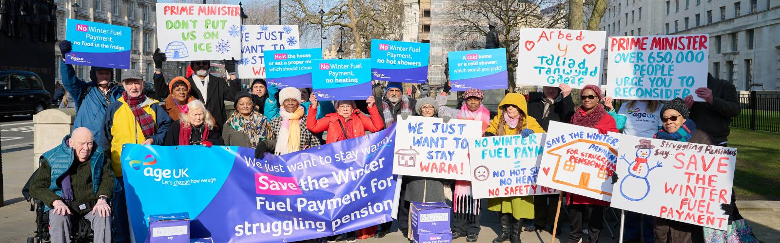 Age UK campaigners with placards